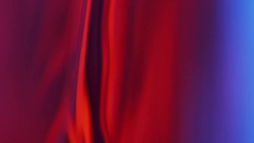 A red substance flows and streams by