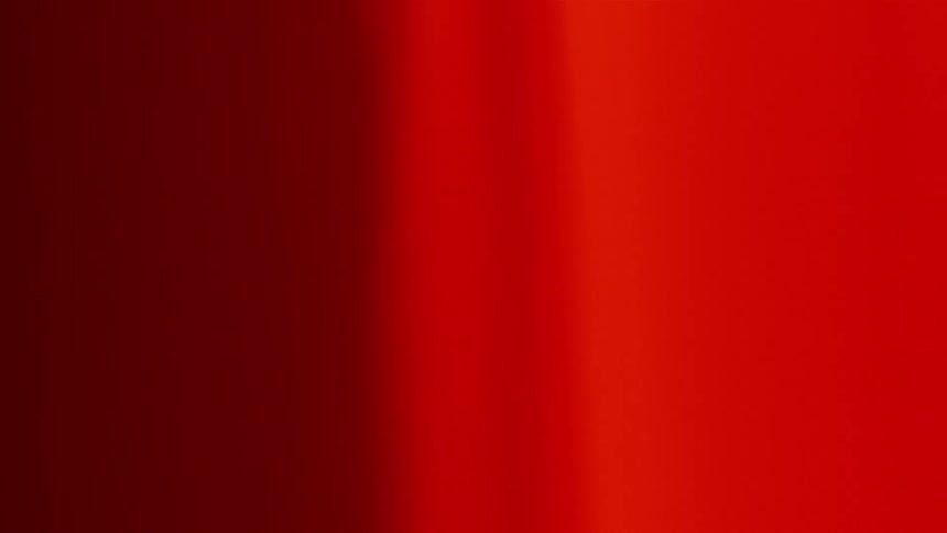 A red substance streams and flows