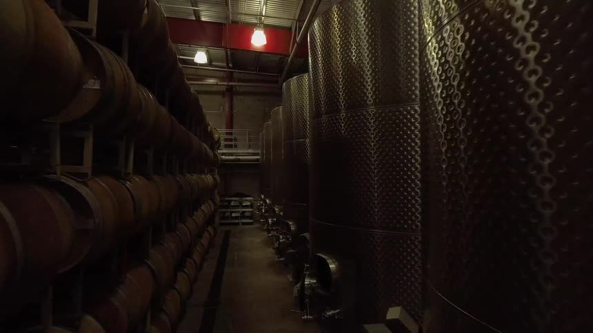 A building lined with barrels and vats
