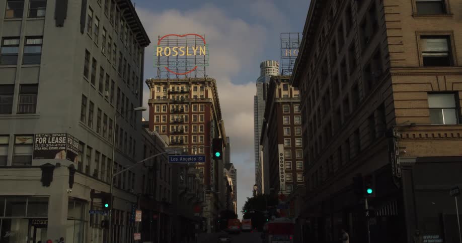 A car drives on a city street