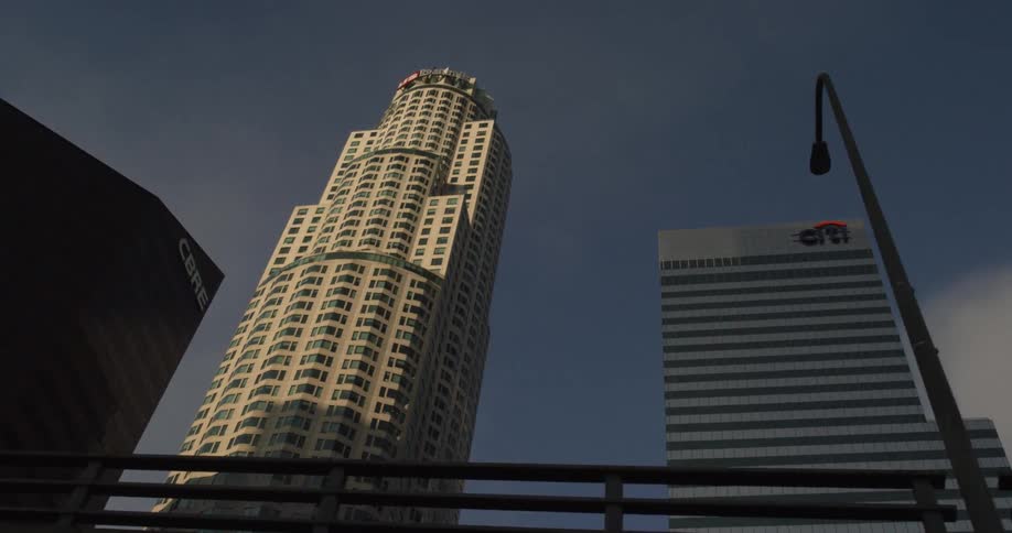 Tall city buildings tower into the sky