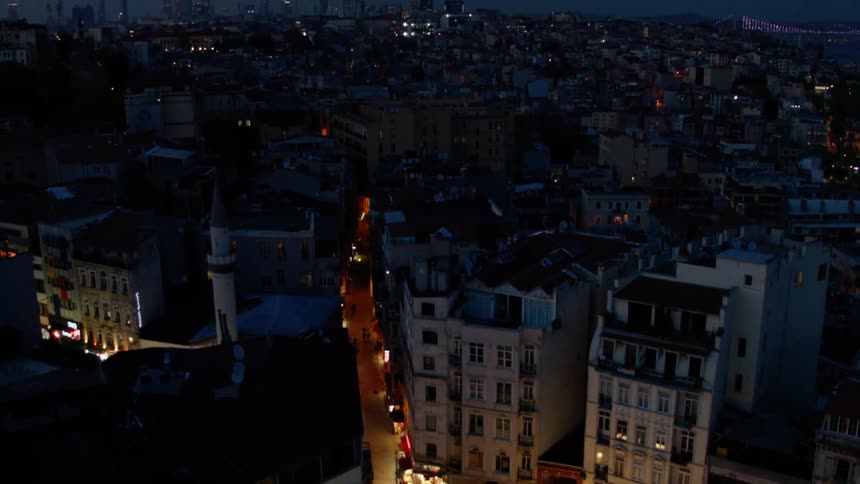 City lights illuminate the night sky