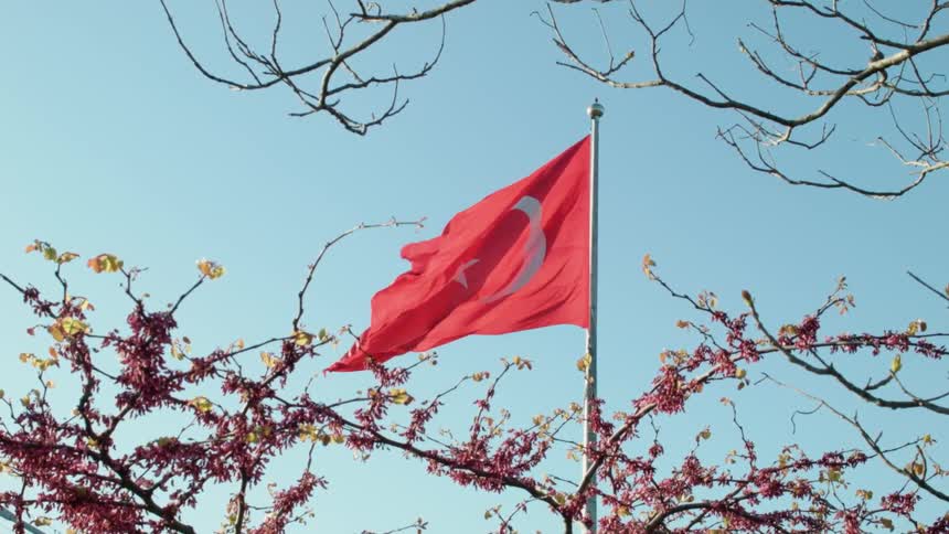 A turkey national flag waves in the breeze