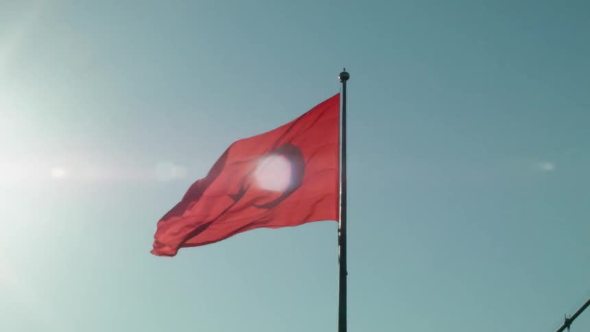 A turkey national flag waves in the breeze