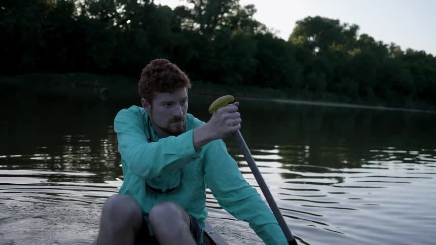 Man paddling in a lake