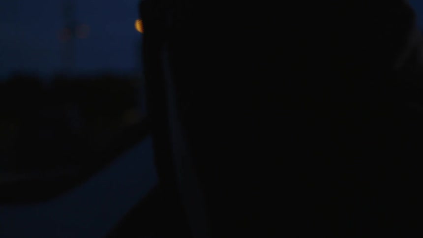 Man gets out of his vehicle in the dark