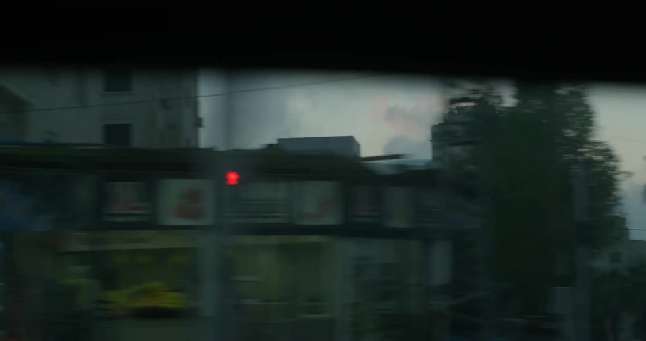 Traveling view of a city on a cloudy day