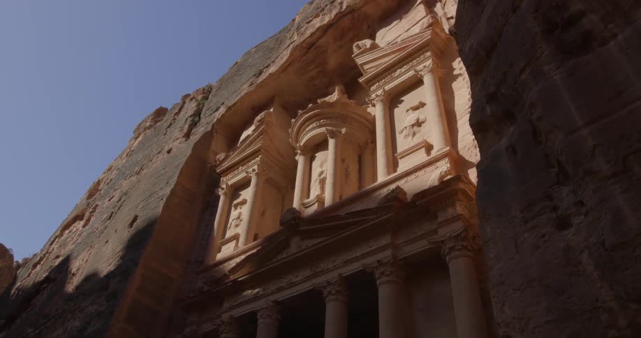 A building front carved into a mountain