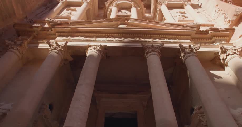 Tall pillars and a doorway of a large building
