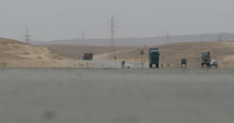 Traffic travels down a highway