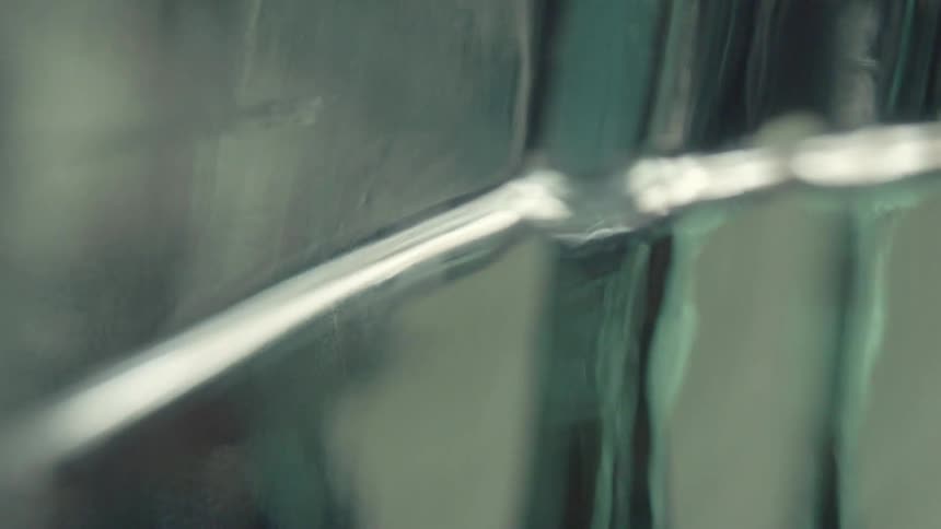 The water in the glasses rises up and down