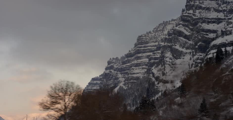 Snow covered mountains on a cloudy day