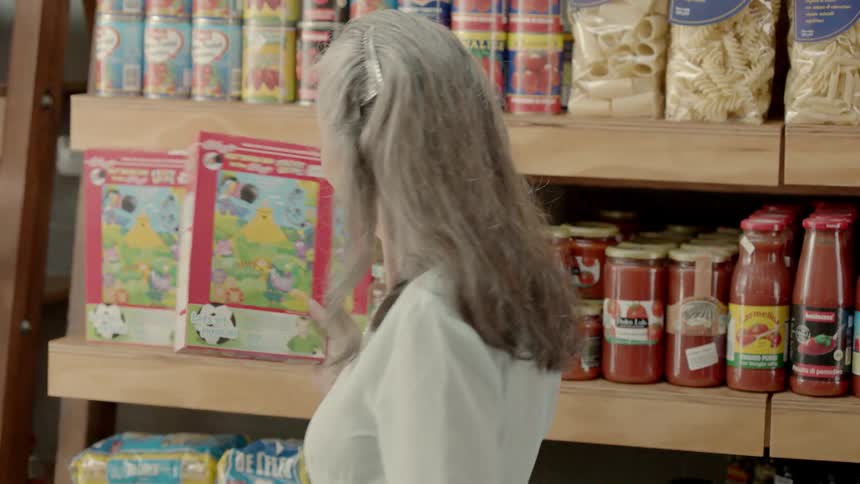 A woman is shopping for groceries