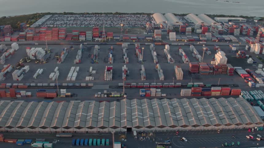 An industrial area lined with metal storage