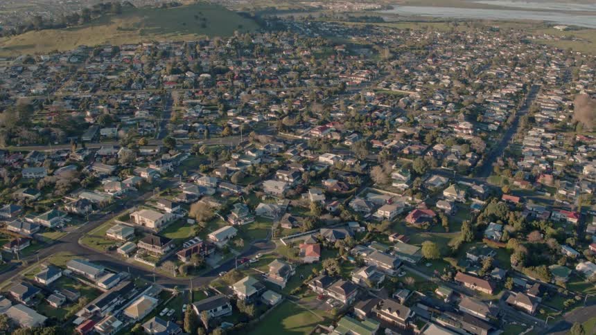 A large town is filmed from the air