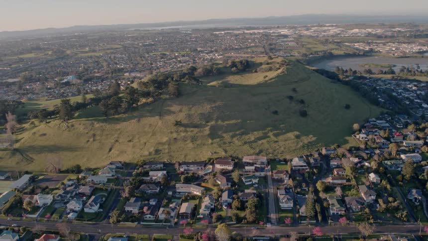 Aerial view of a town that is spread out of the land