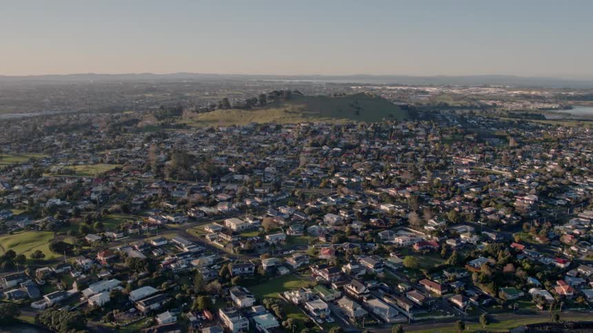 A large town is being filmed from a drone