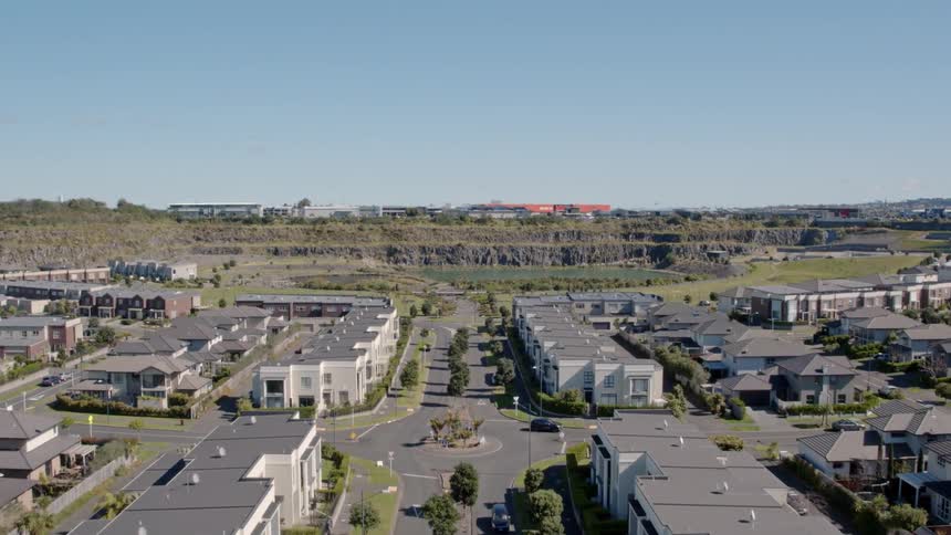 A small neighborhood is filmed from the air