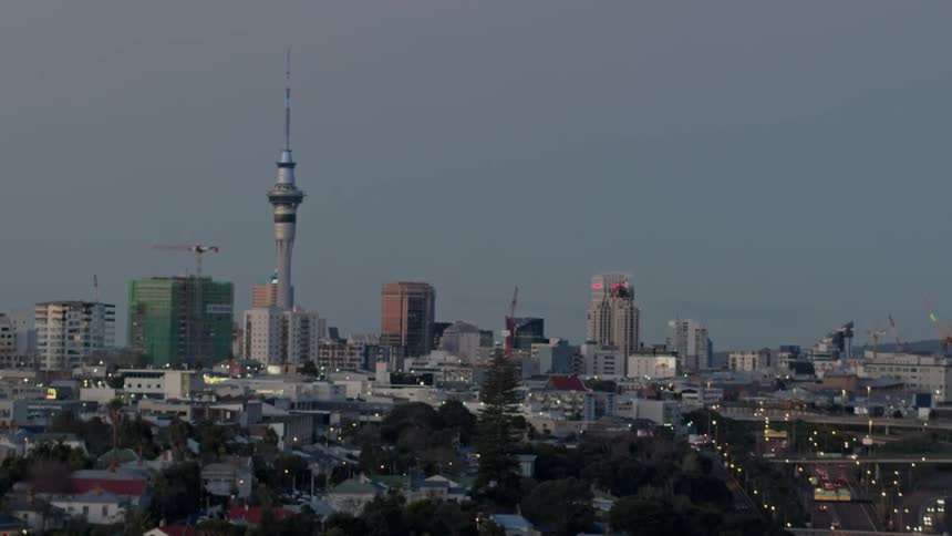 City buildings stand in the distance
