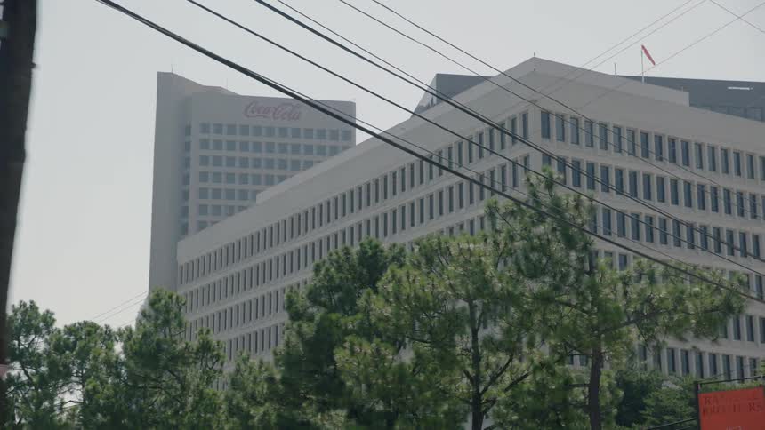 Power lines hang above the city road
