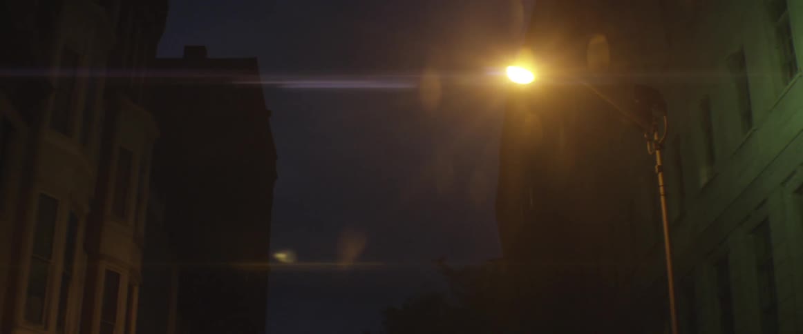 A street lamp shines overhead