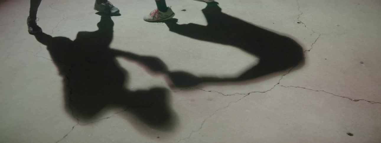 The shadows of boxers sparring