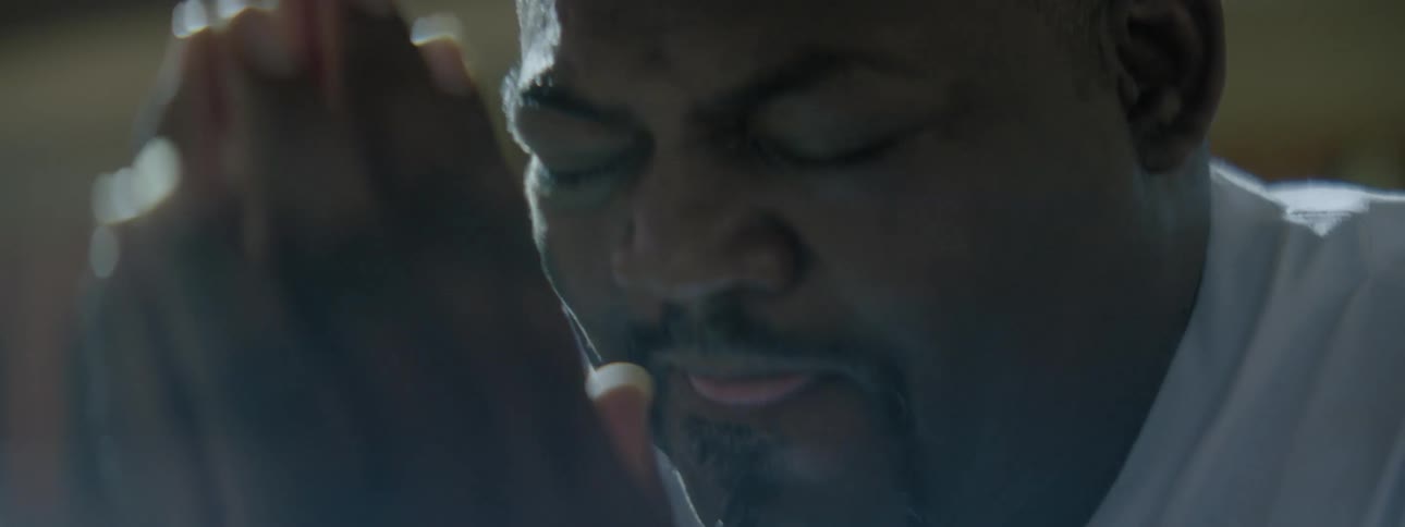 A man prays in a church