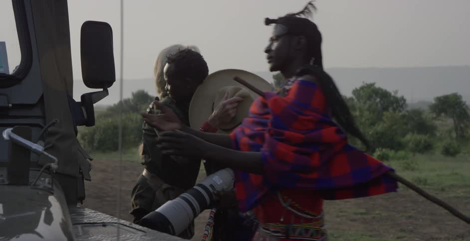 A photographer visits with maasai