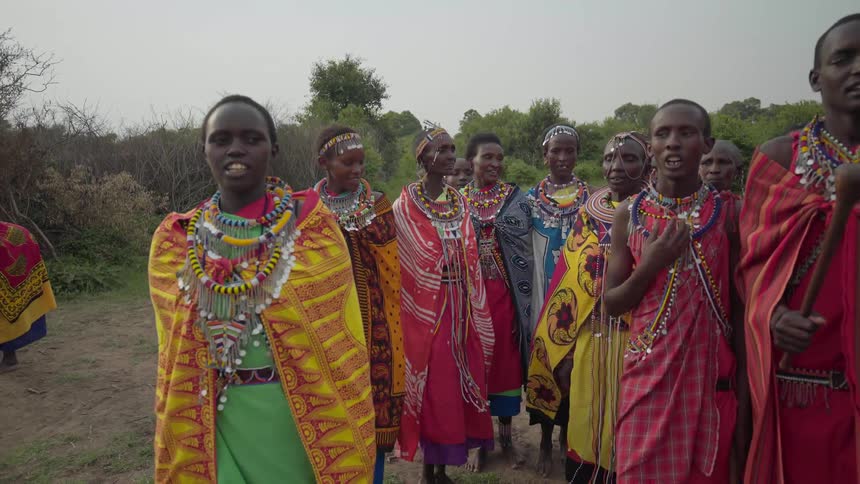 Maasai are dancing in front of the camera