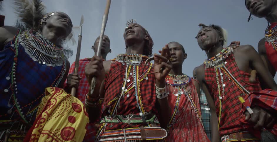 A group of maasai sing and chant together