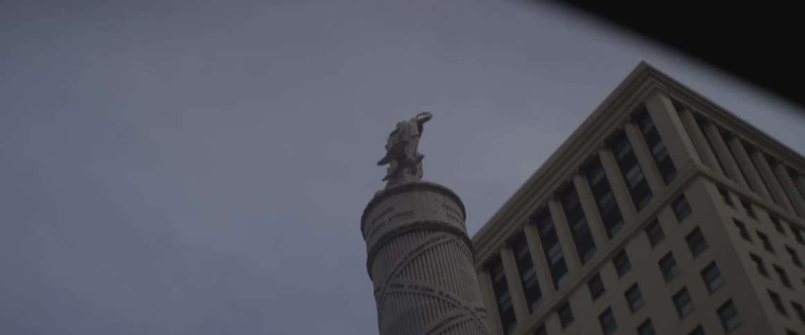 A statue at dusk