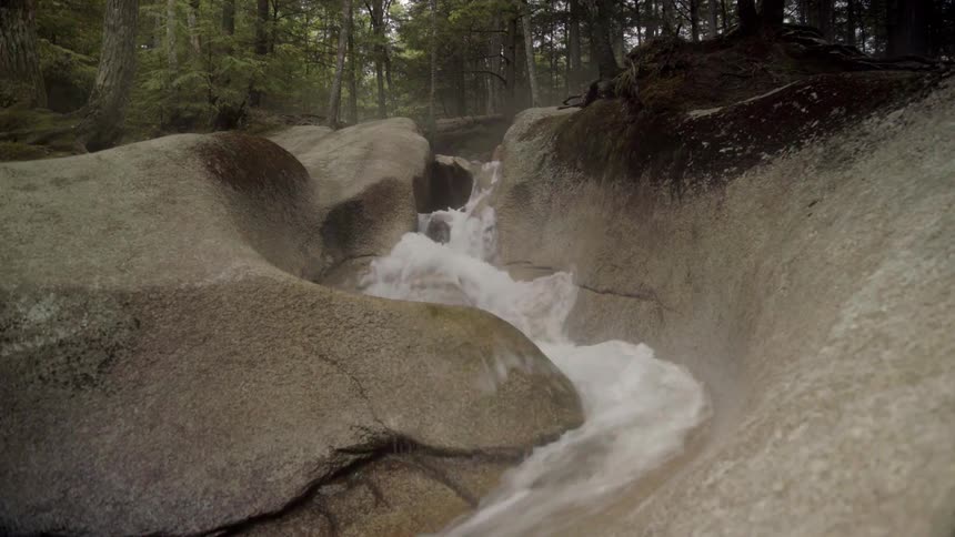 River water flows down a rock waterway