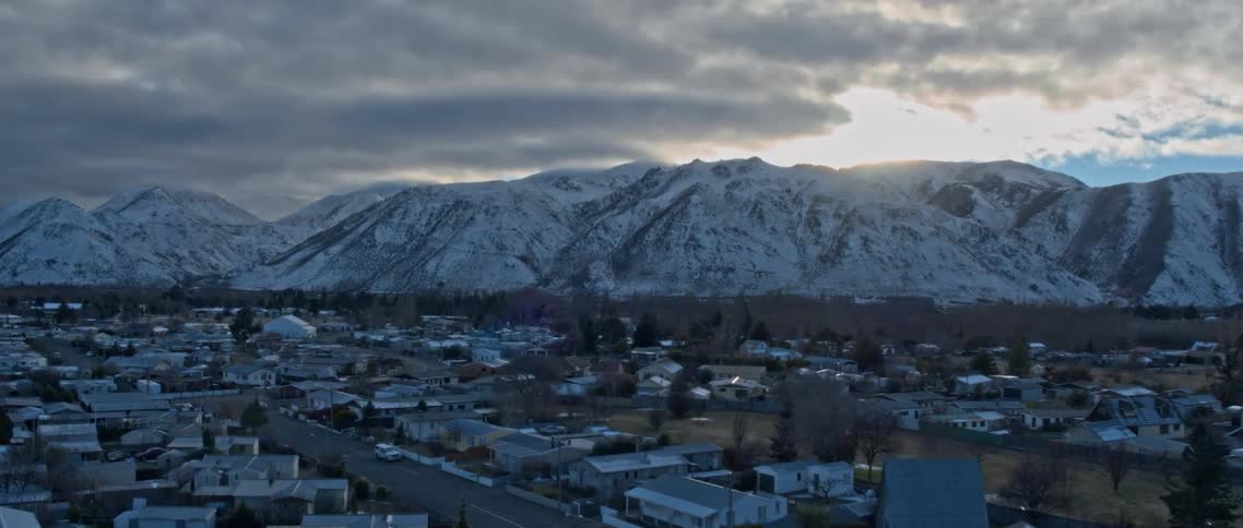 View of a city surrounded by mountains