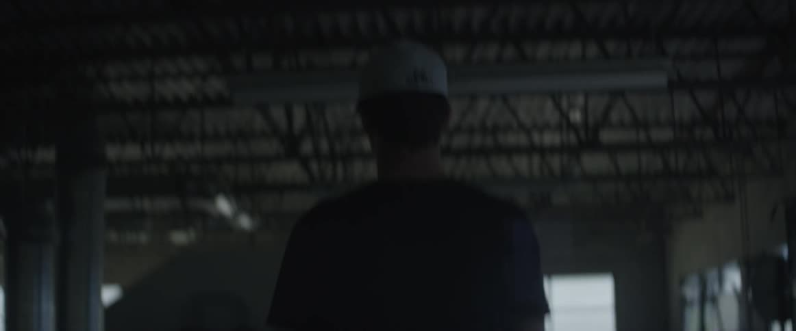 A man walks around a gym