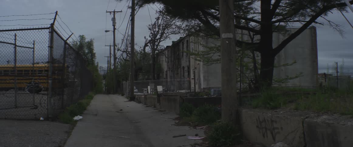 An alley in a city on an overcast day