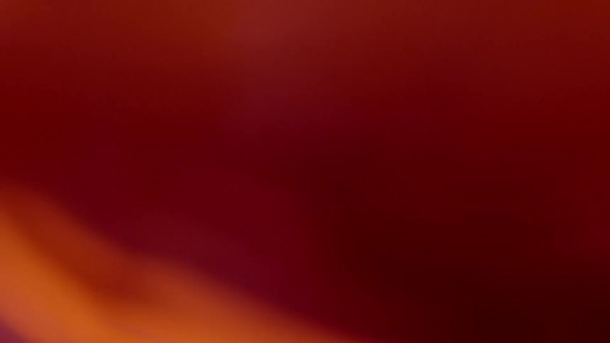 Swirling red and orange liquid