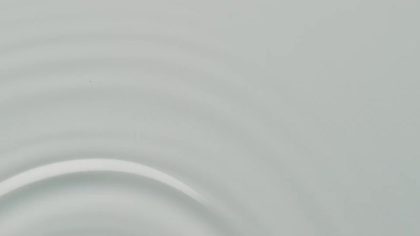Ripples move along the water's surface