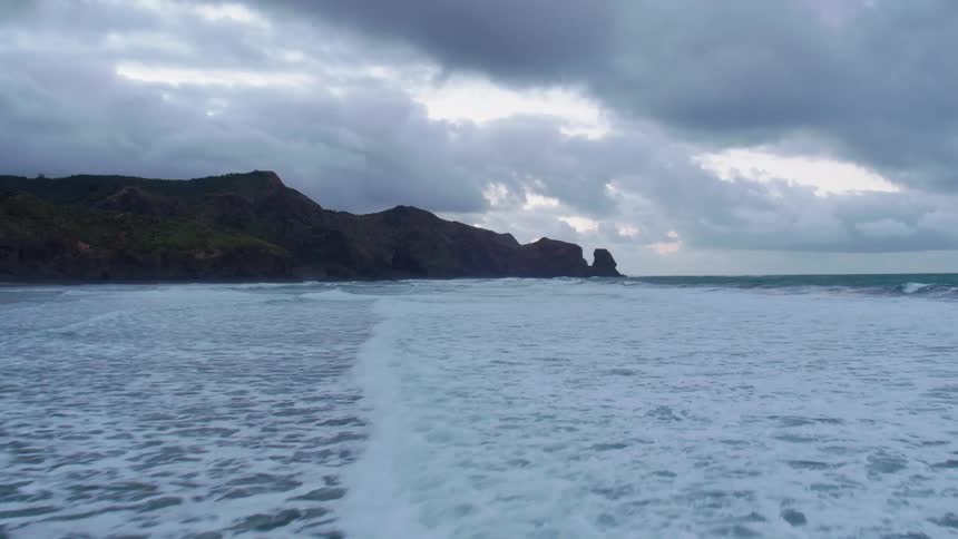 Large body of water and a hilly island