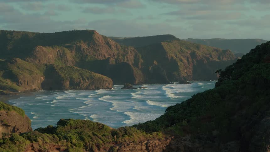 Waves flow onto the rocky shore