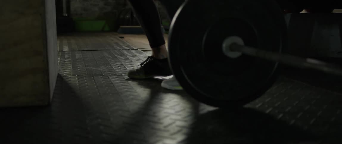 A woman trains in a gym