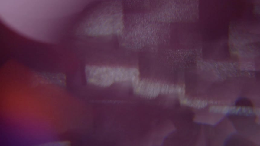 Flickering static television monitors are in a prism effect
