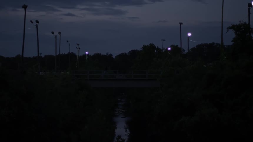 The night sky is sparsely lit