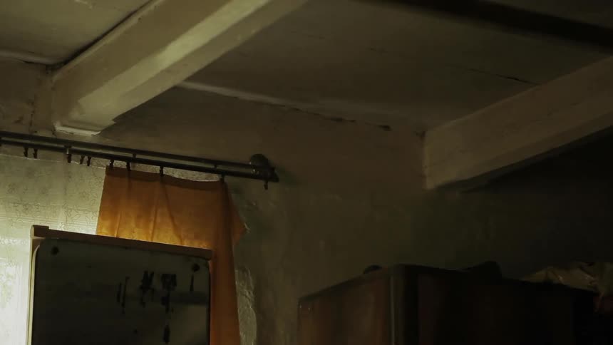 A man walks through a room at home