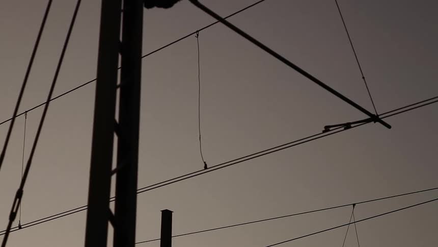Wires are shown in a grey night