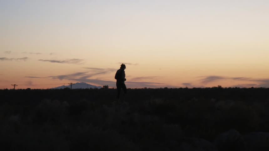 Someone walks out in the desert