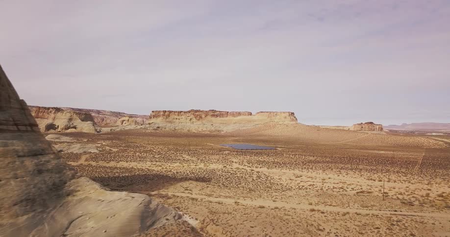 Valley surrounded by low rocky ridges