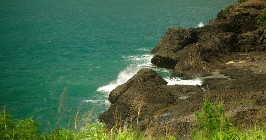 Waves crash onto the rocky shore