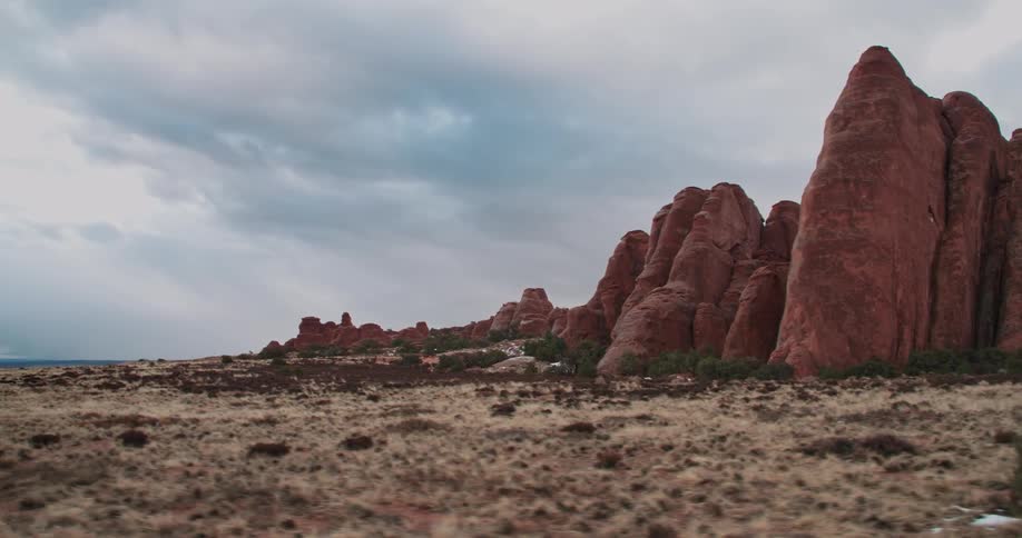 A desert with large rock hills