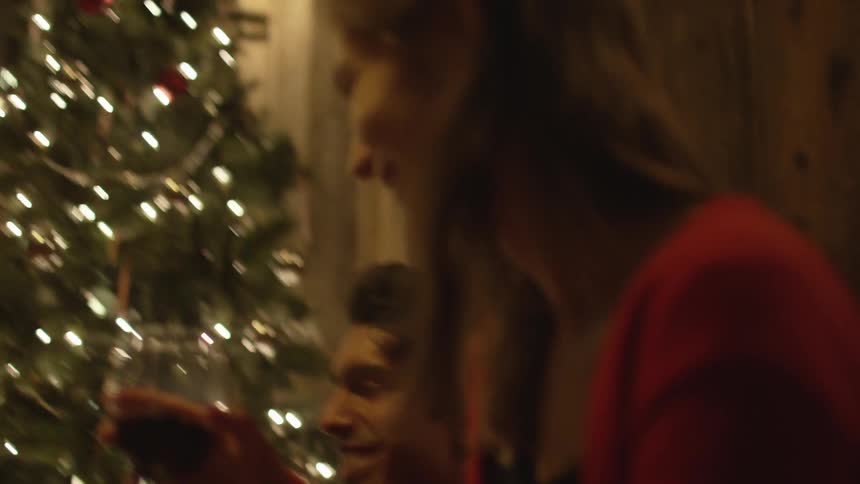 People are sharing drinks at christmas