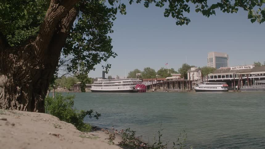 Large ferry boats travel through the canal